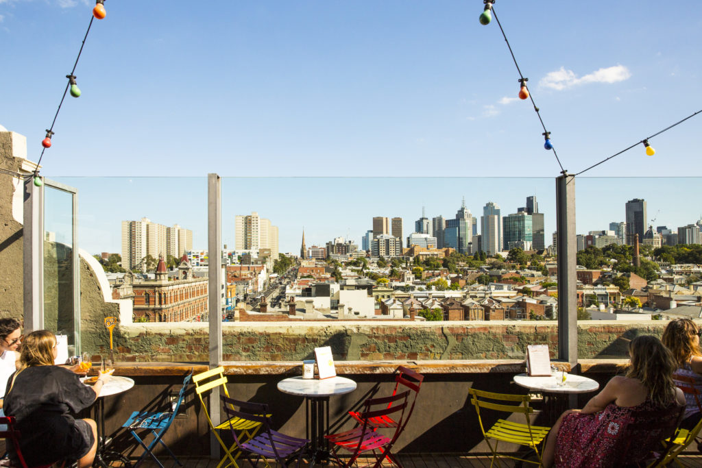 Grab a drink at a rooftop bar like Naked Upstairs