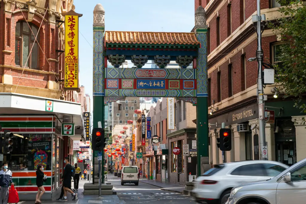 The entrance to Chinatown in Melbourne, which is marked by a large green-coloured gate in the traditional style