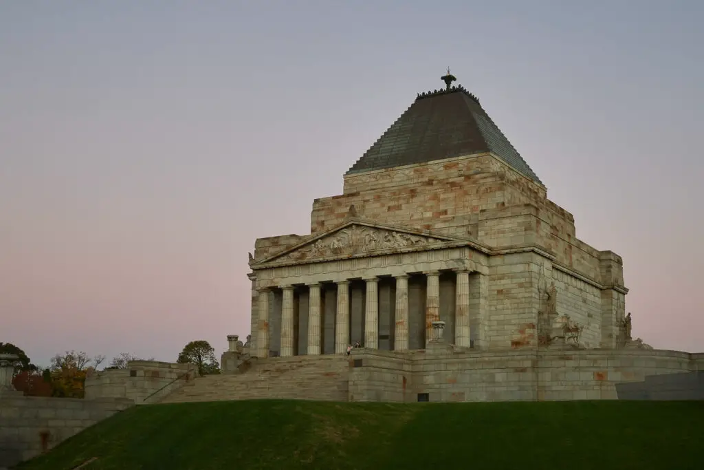 The outside of the Shrine of Remembrance in Melbourne, a sand-coloured stone building